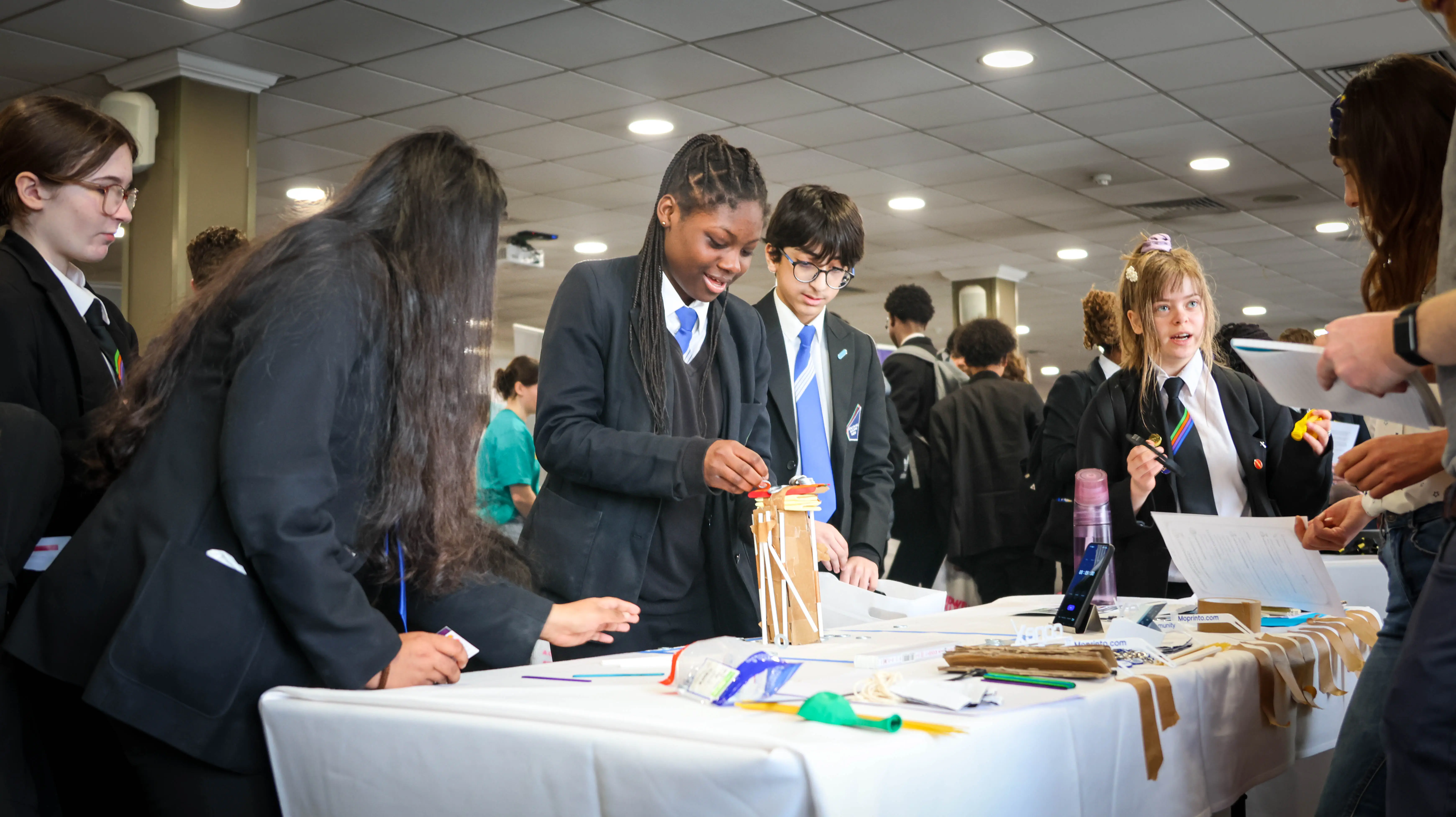 Group of students working together on an engineering project