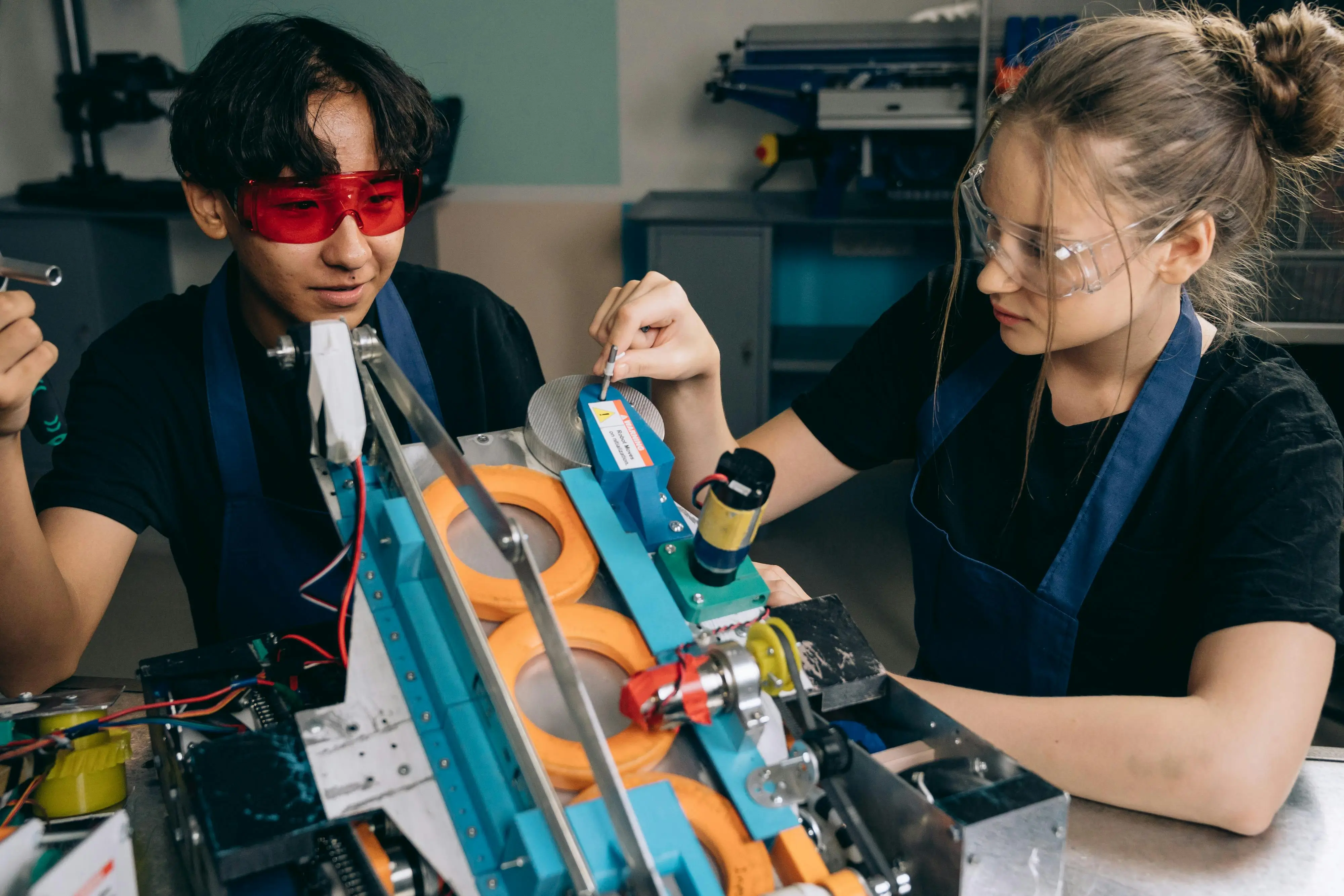 Two students working on an engineering project